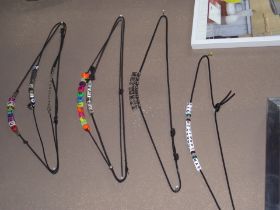 Collection of HHH Necklaces.JPG