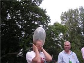 Blowing up a condom Haghue H3 2010.jpg